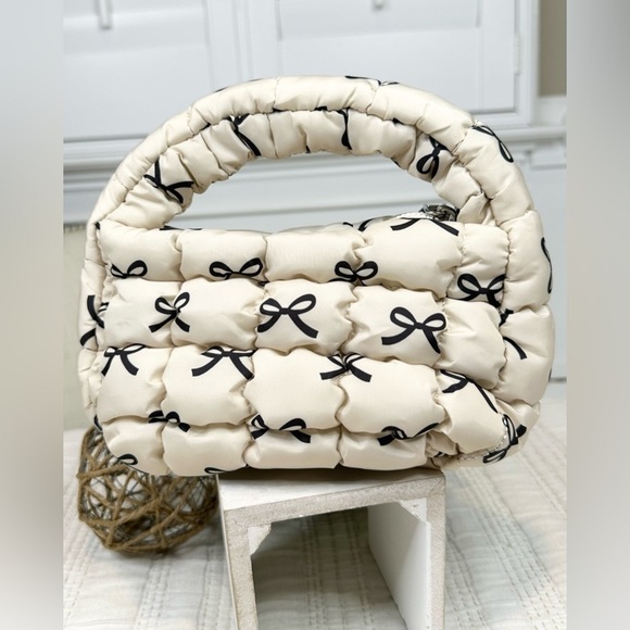 Small Puffer Bag Cream with Black Bows - Picture 1 of 8